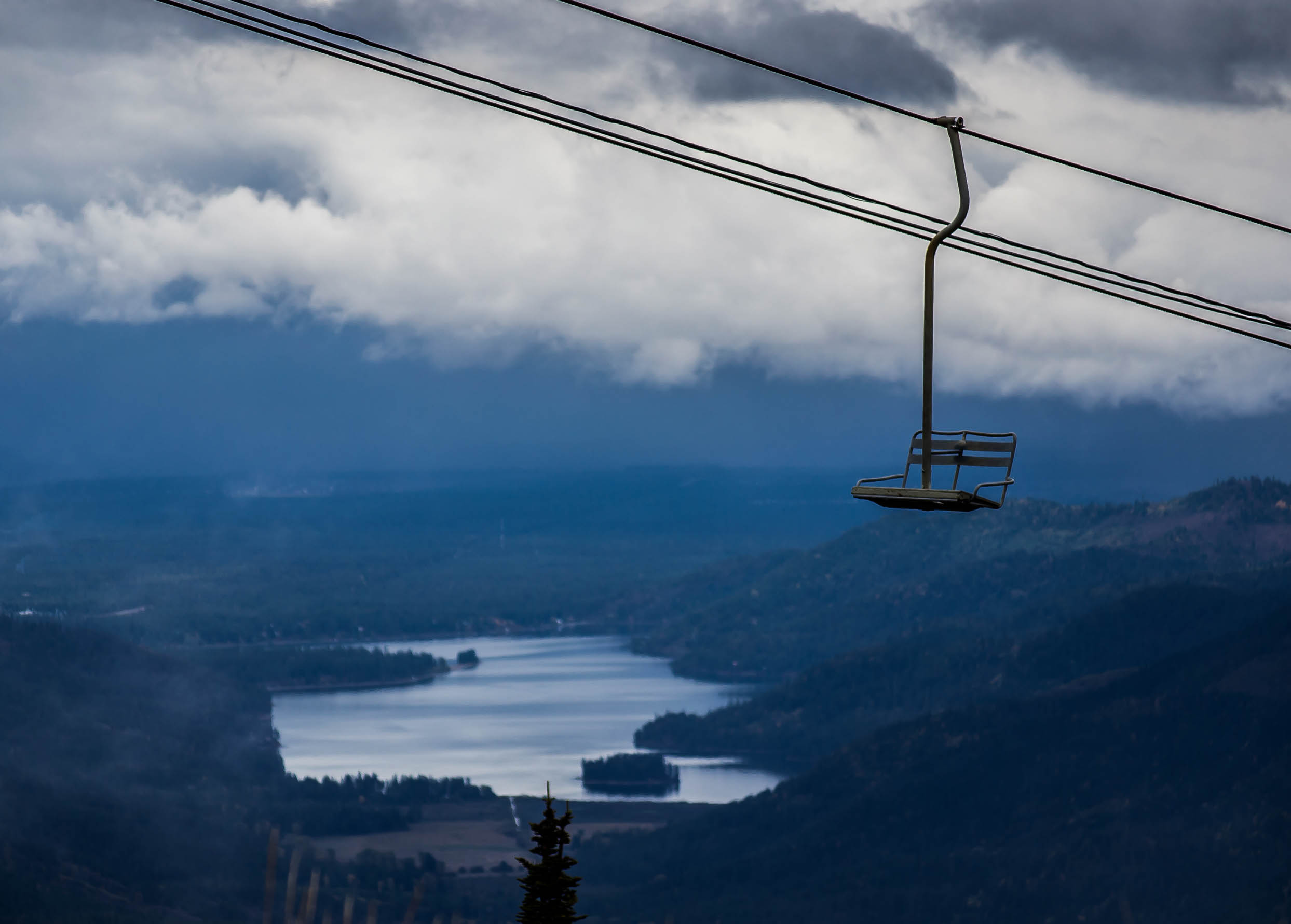 Mt Spokane - Foreground: Empty Chairlift, Background: Spirit Lake